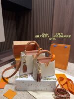 2025 new multi-color pebbled handbag, fashionable pendant lady bag, large capacity single shoulder crossbody bag, commuter bag