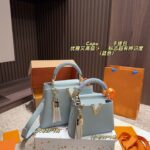 2025 new multi-color pebbled handbag, fashionable pendant lady bag, large capacity single shoulder crossbody bag, commuter bag