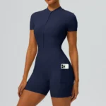 New Trendy Nude Feeling Short Sleeve Yoga Jumpsuit for Women, Half Zipper Front Fitness Sports Romper Shorts Tennis Exercise Unitard with Side Pockets