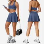 Newest Backless Design Activewear Two Piece Tennis Skirt Sets for Women, Cross-Waisted Mini Skirt with Halter Neck Sports Bra Color-Blocked Athletic Outfits