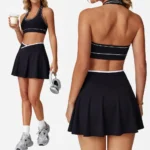 Newest Backless Design Activewear Two Piece Tennis Skirt Sets for Women, Cross-Waisted Mini Skirt with Halter Neck Sports Bra Color-Blocked Athletic Outfits
