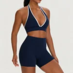 Top Selling 2PCS Hottest Sexy Gym Training Clothes for Woman, Color-Blocked Plunge V Neck Sports Bra with Back Pocket Workout Shorts Backless Yoga Set