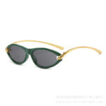 European and American cat-eye sunglasses for women, high-end oval metal ins trend fashion street photography sunglasses wholesale