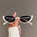 Half-frame cat-eye personalized sunglasses, European and American women's sunglasses, fashion street photography, trendy retro glasses frames, high-end
