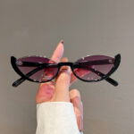 Half-frame cat-eye personalized sunglasses, European and American women's sunglasses, fashion street photography, trendy retro glasses frames, high-end