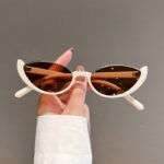 Half-frame cat-eye personalized sunglasses, European and American women's sunglasses, fashion street photography, trendy retro glasses frames, high-end