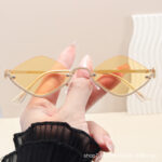 New personalized half-frame rhombus metal sunglasses for women, high-end European and American outdoor sunscreen fashion sunglasses wholesale